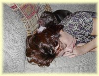 Marcia and Bebel on the couch napping.